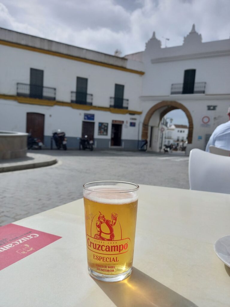 Enjoying a beer at the entrance to the town of Conil.